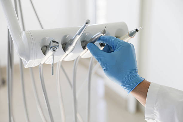 Professional Tooth Extraction technician working in Titusville, FL